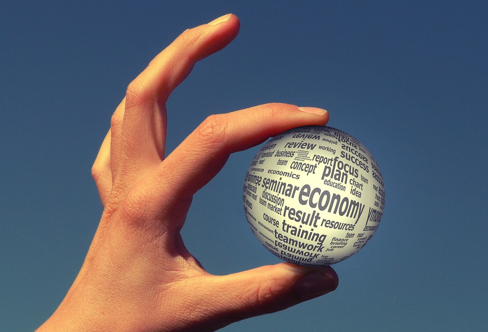 holding globe